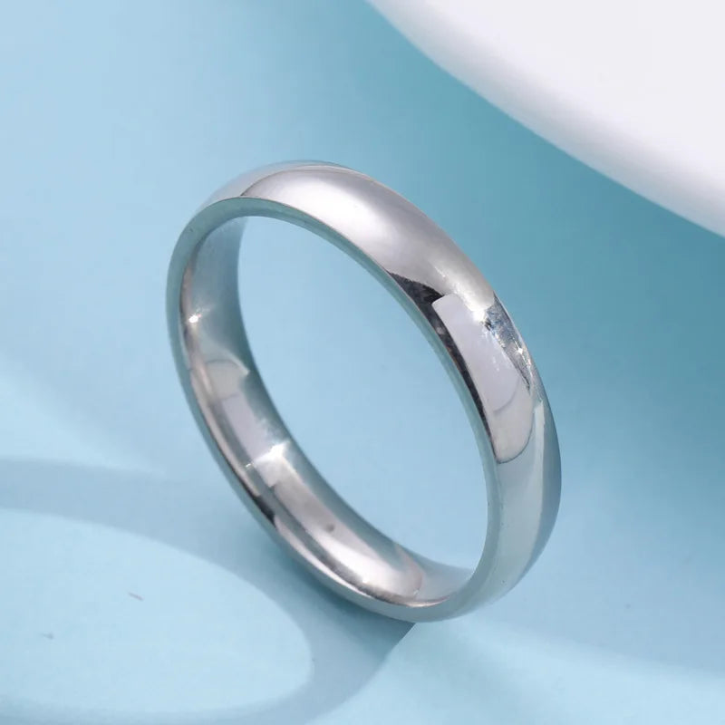 Anillo de acero inoxidable liso y sencillo a la moda para mujeres y hombres, anillos de pareja clásicos, joyería de compromiso para bodas